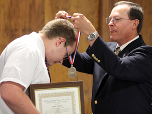 Students, teacher receive awards, scholarships